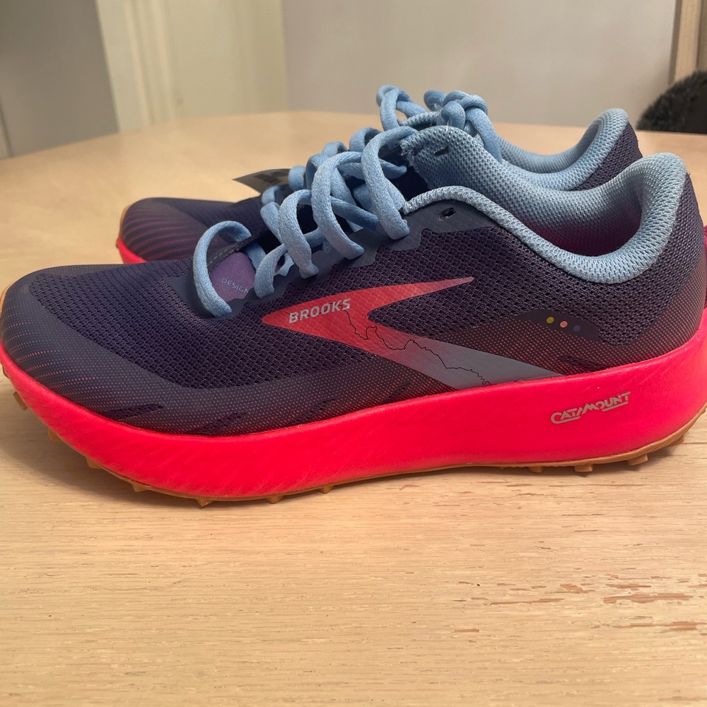 Brooks running Sneakers. New with tags woman size 8 could be unisex.